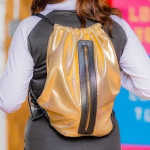 Gold metallic zip up back pack